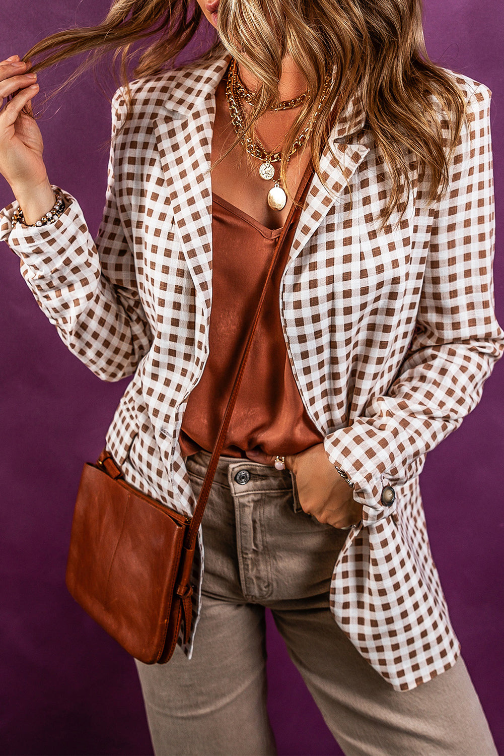 Elevate your style with our Brown &amp; White Chestnut Single Button Blazer! Its lapel collar adds a touch of sophistication, while the single button closure creates a flattering silhouette. Perfect for any occasion, this blazer will make you stand out in all the right ways.