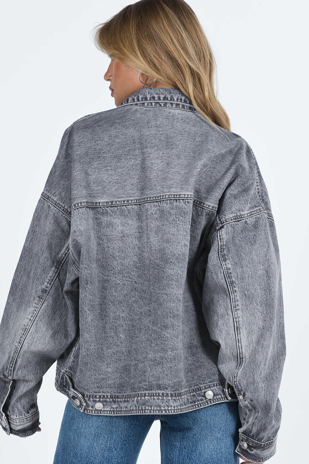 Get ready to rock any look with our Gray Chest Pockets Drop Shoulder Loose Denim Jacket. The ultimate layering piece, its versatile fit is perfect for all body types. The metal buttons add a touch of cool and durability, while the drop shoulder design gives off an effortless vibe. Plus, the chest pockets add both practicality and style.