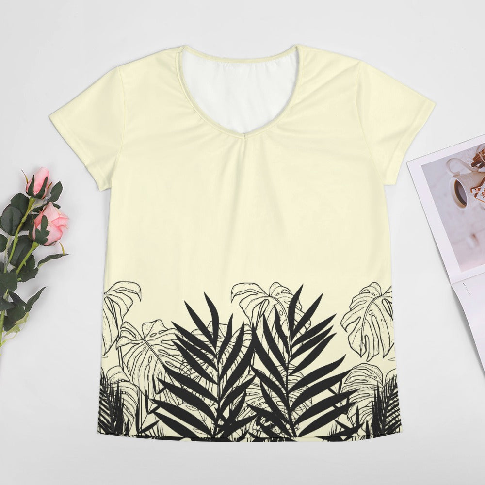 Elevate your style with our beige designer graphic V-neck short sleeve t-shirt and matching slacks. The black silhouette tropical leaf print adds a touch of tropical elegance to your look. Step into the world of effortless sophistication with this versatile and stylish outfit.