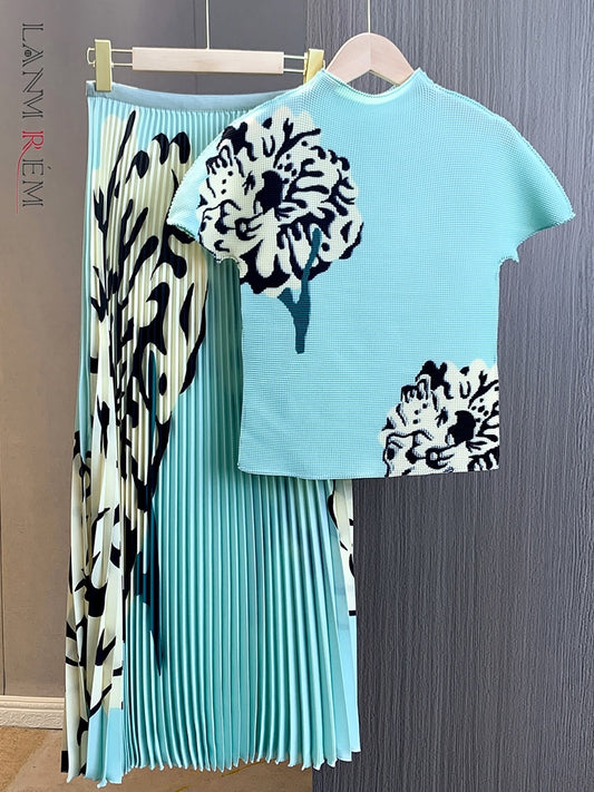 Get ready to stand out in this fun, flirty outfit! Our Teal Colored Short Sleeved Top and Matching Pleated Skirt feature a beautiful floral design on either a teal or pale yellow background. The round neck adds a touch of elegance while the short sleeves keep it casual. Perfect for any occasion, this combo is a must-have for your wardrobe