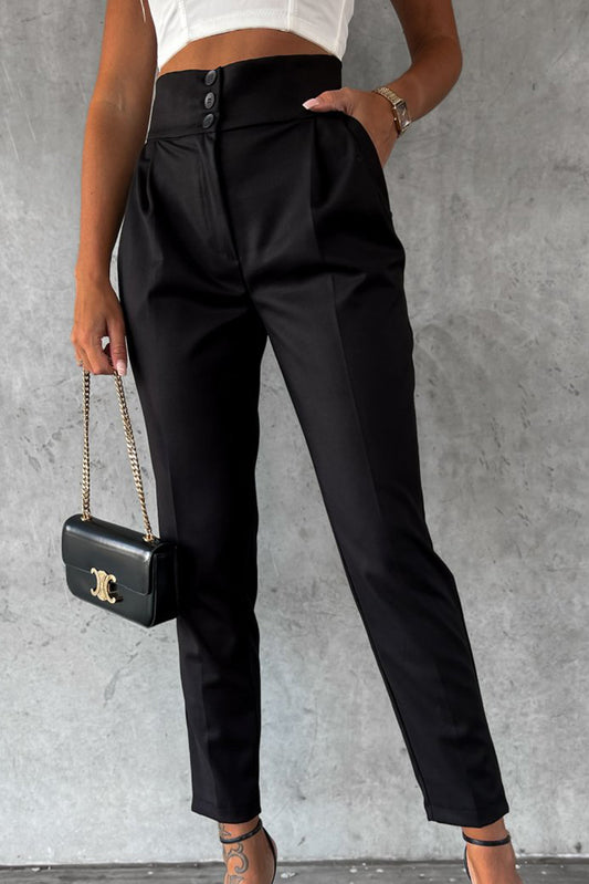 Elevate your style with our Black Button High Waist Tapered Pants. These sleek and sophisticated pants feature a high-waisted design and tapered fit, providing a flattering silhouette and comfortable fit. Perfect for any occasion, the button detailing adds a touch of elegance. Experience fashion and function in one!