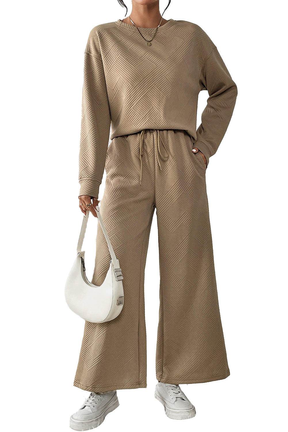 Transform your wardrobe with our Loose &amp; Comfy Khaki Wide Leg Outfit Set! Experience ultimate comfort and style with this versatile and chic set. Made with a loose and flowy design, it's perfect for any occasion. Upgrade your look and feel confident all day long.