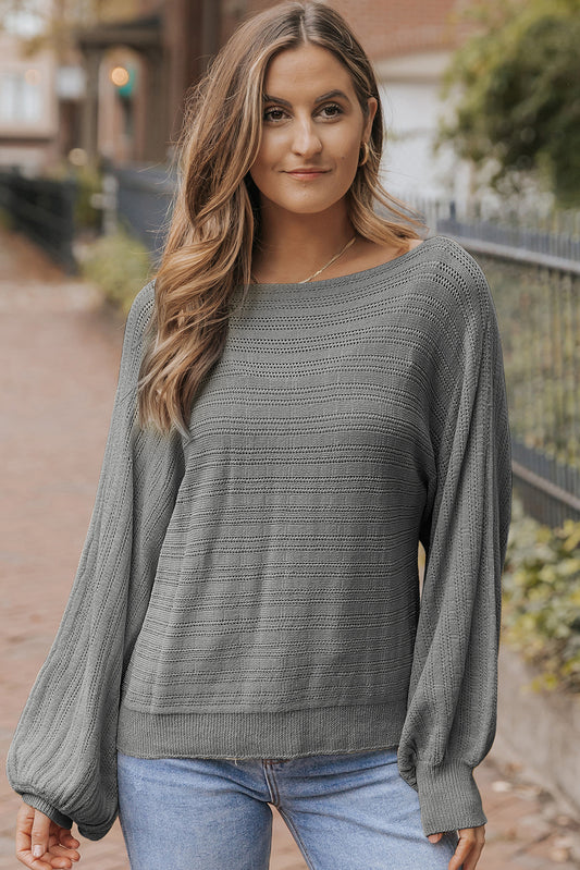 Experience cozy comfort and chic style with our Dark Grey Lantern Sleeve Eyelets Textured Knit Sweater! The eyelet details and textured knit add beautiful dimension to the dark grey color, while the lantern sleeves give a unique touch. Stay warm and stylish this season with this must-have sweater.