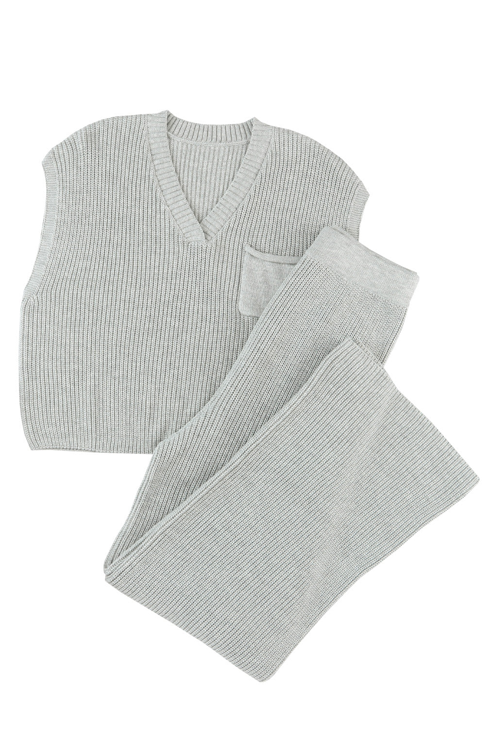 Stay stylish and cozy this fall and winter with our Gray Knitted V Neck Sweater and Casual Pants Set! Made with soft and warm knitted material, this set will keep you comfortable while looking effortlessly chic. The cap sleeve sweater is great for layering or wearing on its own, while the wide pants offer both comfort and style. Upgrade your wardrobe with this must-have set!