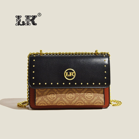 Effortlessly stylish and practical, our Soft Leather Messenger Bag is the perfect accessory for any outfit. Crafted with soft leather and adorned with a gold chain shoulder strap, it adds a touch of elegance to your look while keeping your essentials close at hand. Upgrade your style game today!