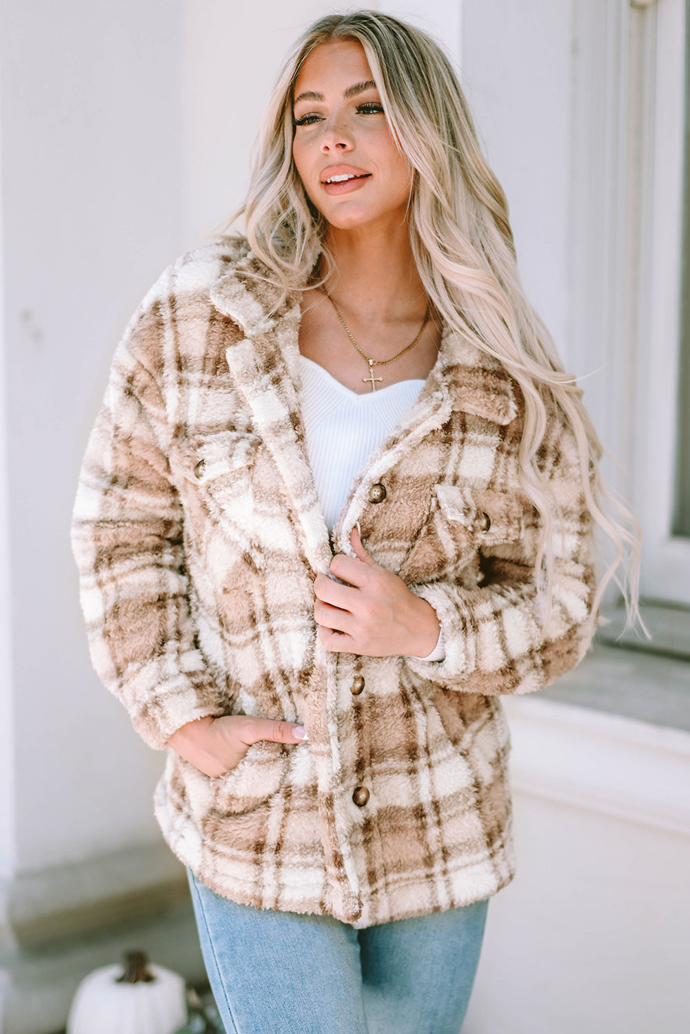 Stay warm and stylish with our Khaki Sherpa Plaid Button Pocketed Jacket. Made with soft sherpa, this jacket will keep you comfortable all day long. The spacious pockets allow for easy storage of essentials. Crafted with high-quality materials, you can count on this jacket to last. The classic plaid pattern and button front add a timeless touch to any outfit.