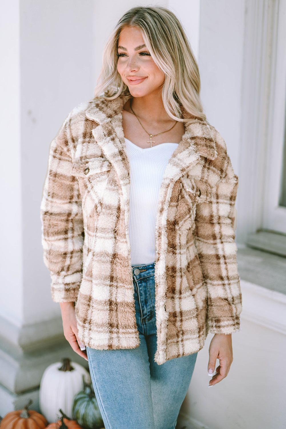 Stay warm and stylish with our Khaki Sherpa Plaid Button Pocketed Jacket. Made with soft sherpa, this jacket will keep you comfortable all day long. The spacious pockets allow for easy storage of essentials. Crafted with high-quality materials, you can count on this jacket to last. The classic plaid pattern and button front add a timeless touch to any outfit.