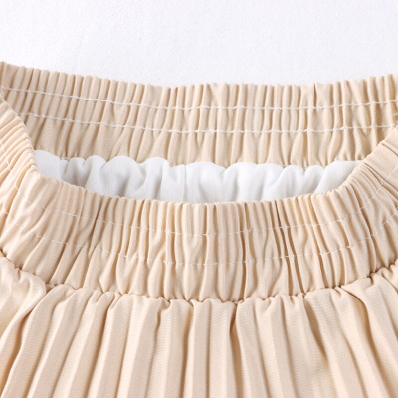 Experience timeless elegance with our Elegant Vintage Irregular Ruffles Pleated Midi Skirt! The high waist and pleats create a flattering silhouette while the irregular ruffles add a touch of vintage charm. The elastic waistband ensures a comfortable fit, making this the perfect addition to your wardrobe. Elevate your style and feel confident in this stunning skirt!