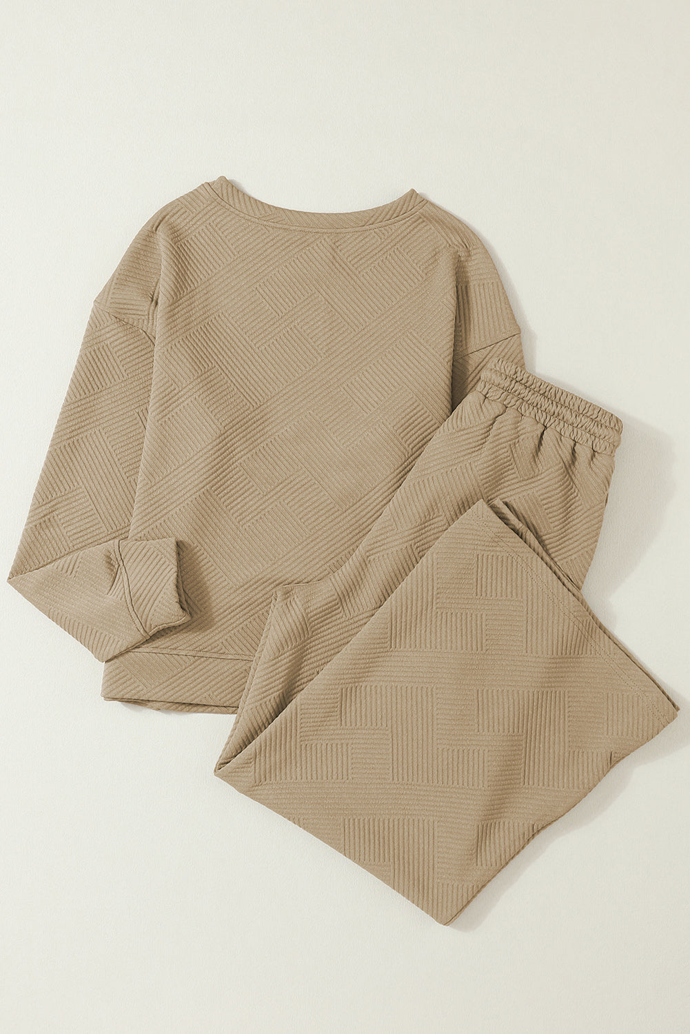 Transform your wardrobe with our Loose &amp; Comfy Khaki Wide Leg Outfit Set! Experience ultimate comfort and style with this versatile and chic set. Made with a loose and flowy design, it's perfect for any occasion. Upgrade your look and feel confident all day long.