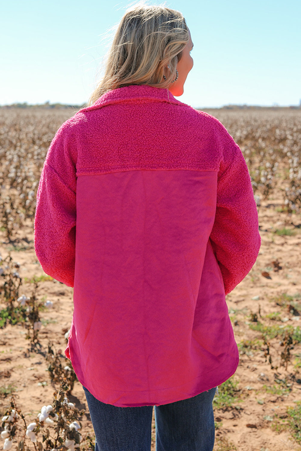 Introducing a cozy yet vibrant addition to your wardrobe: the Bright Pink Faux Suede Sherpa Button-Up Cardigan. Crafted with comfort and style in mind, this cardigan offers both warmth and flair, perfect for the modern woman who values both fashion and functionality