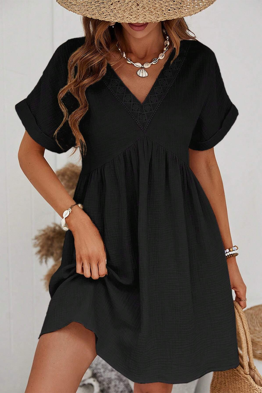 Elevate your wardrobe with our Black Short Sleeve Lace V-Neck Mini Dress! The delicate lace and flattering v-neck design exude femininity and sophistication, making you feel confident and beautiful. Perfect for any special occasion, this dress will be a timeless addition to your style.