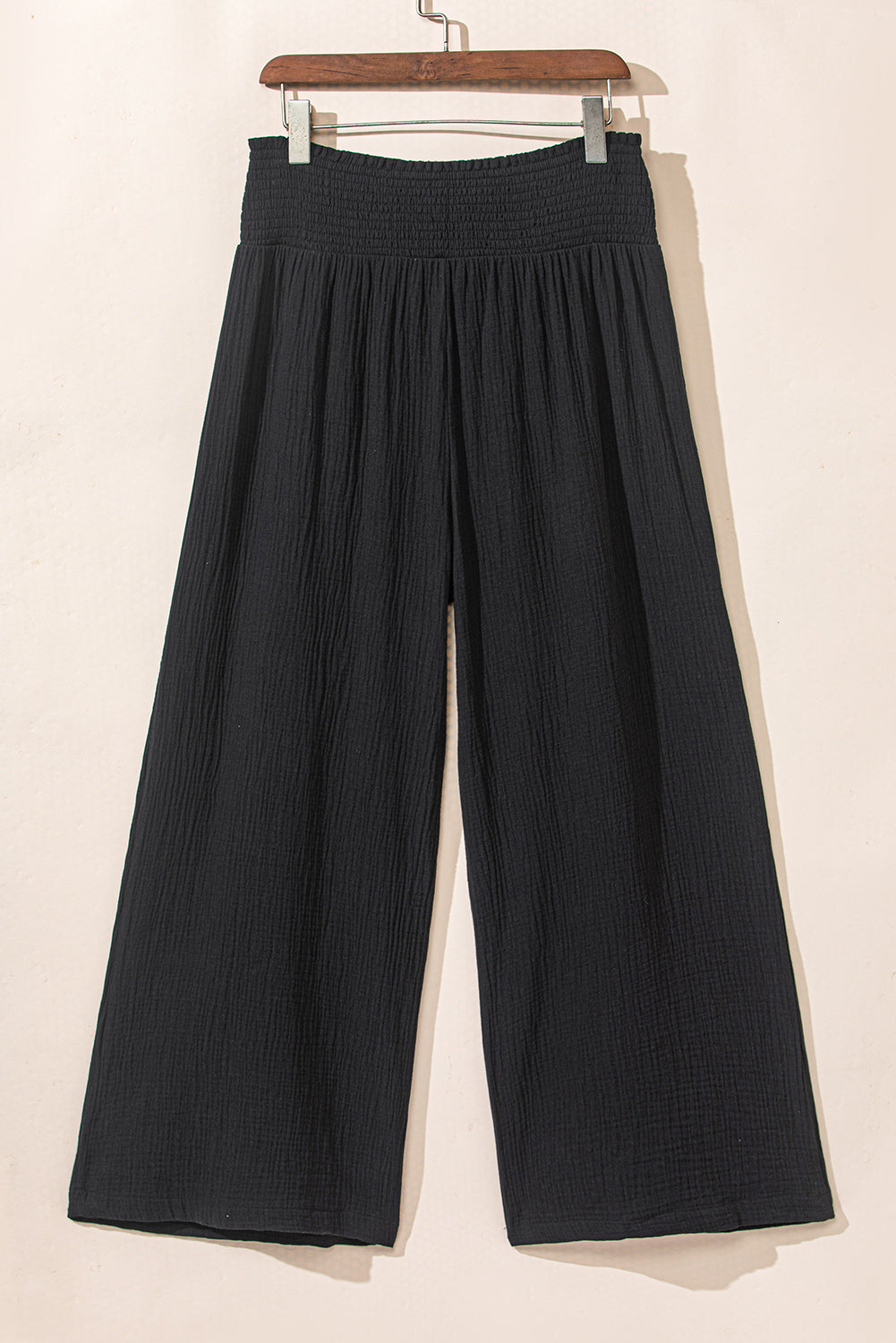 Elevate your style with our Black Textured High Waist Wide Leg Plus Size Pants! These pants feature a flattering high waist design and wide leg fit, providing comfort and confidence. Perfect for any occasion, these pants will have you feeling chic and stylish.