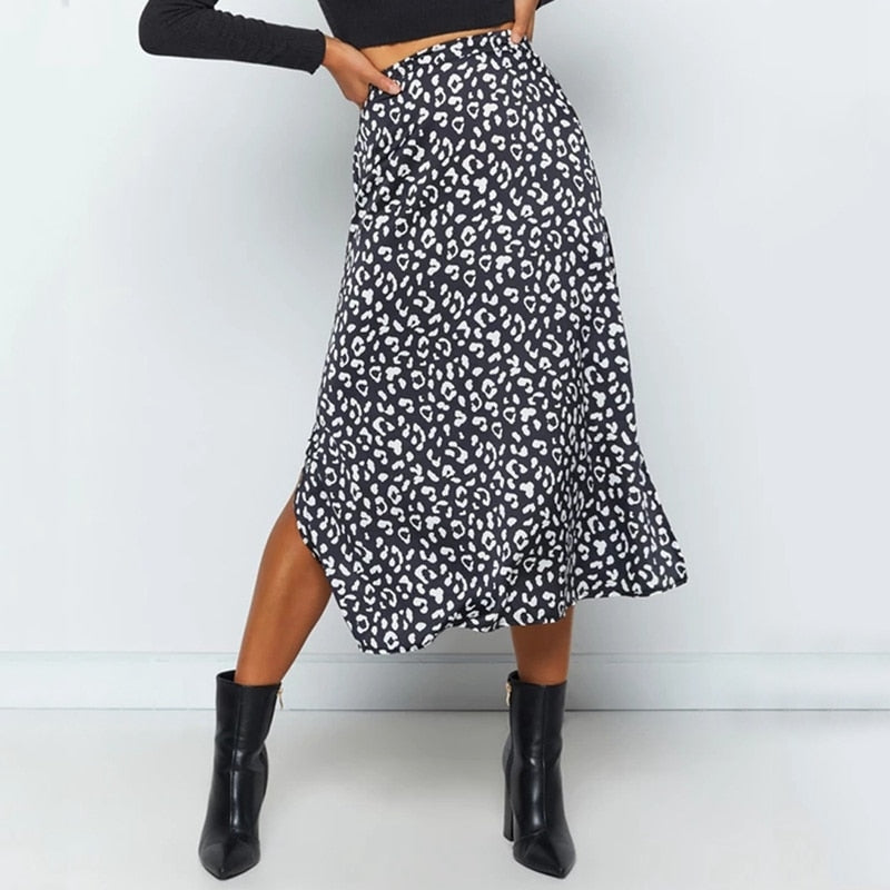 Indulge in the wild side with our Sexy Leopard Print Chiffon Split Long Skirt. The bold animal print and sultry side split make a statement, while the zipper closure adds a touch of convenience. Channel your inner diva and elevate any outfit with this must-have skirt.