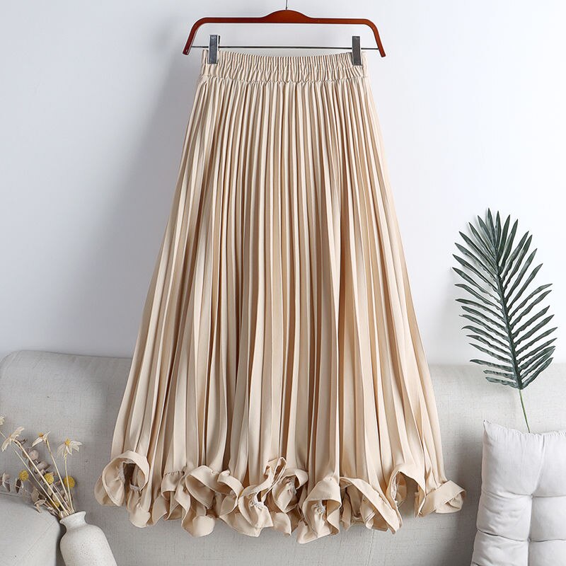 Experience timeless elegance with our Elegant Vintage Irregular Ruffles Pleated Midi Skirt! The high waist and pleats create a flattering silhouette while the irregular ruffles add a touch of vintage charm. The elastic waistband ensures a comfortable fit, making this the perfect addition to your wardrobe. Elevate your style and feel confident in this stunning skirt!