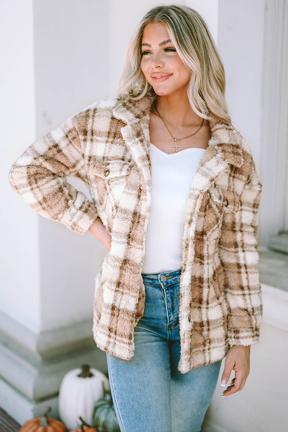 Stay warm and stylish with our Khaki Sherpa Plaid Button Pocketed Jacket. Made with soft sherpa, this jacket will keep you comfortable all day long. The spacious pockets allow for easy storage of essentials. Crafted with high-quality materials, you can count on this jacket to last. The classic plaid pattern and button front add a timeless touch to any outfit.