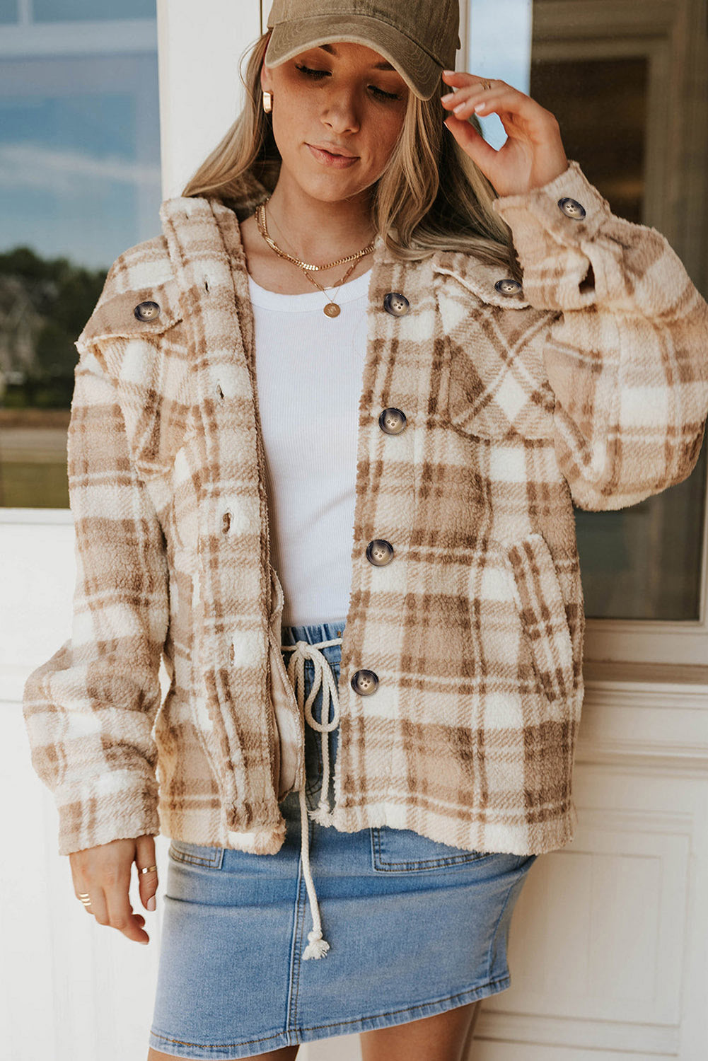 Stay warm and stylish with our Khaki Sherpa Plaid Button Pocketed Jacket. Made with soft sherpa, this jacket will keep you comfortable all day long. The spacious pockets allow for easy storage of essentials. Crafted with high-quality materials, you can count on this jacket to last. The classic plaid pattern and button front add a timeless touch to any outfit.