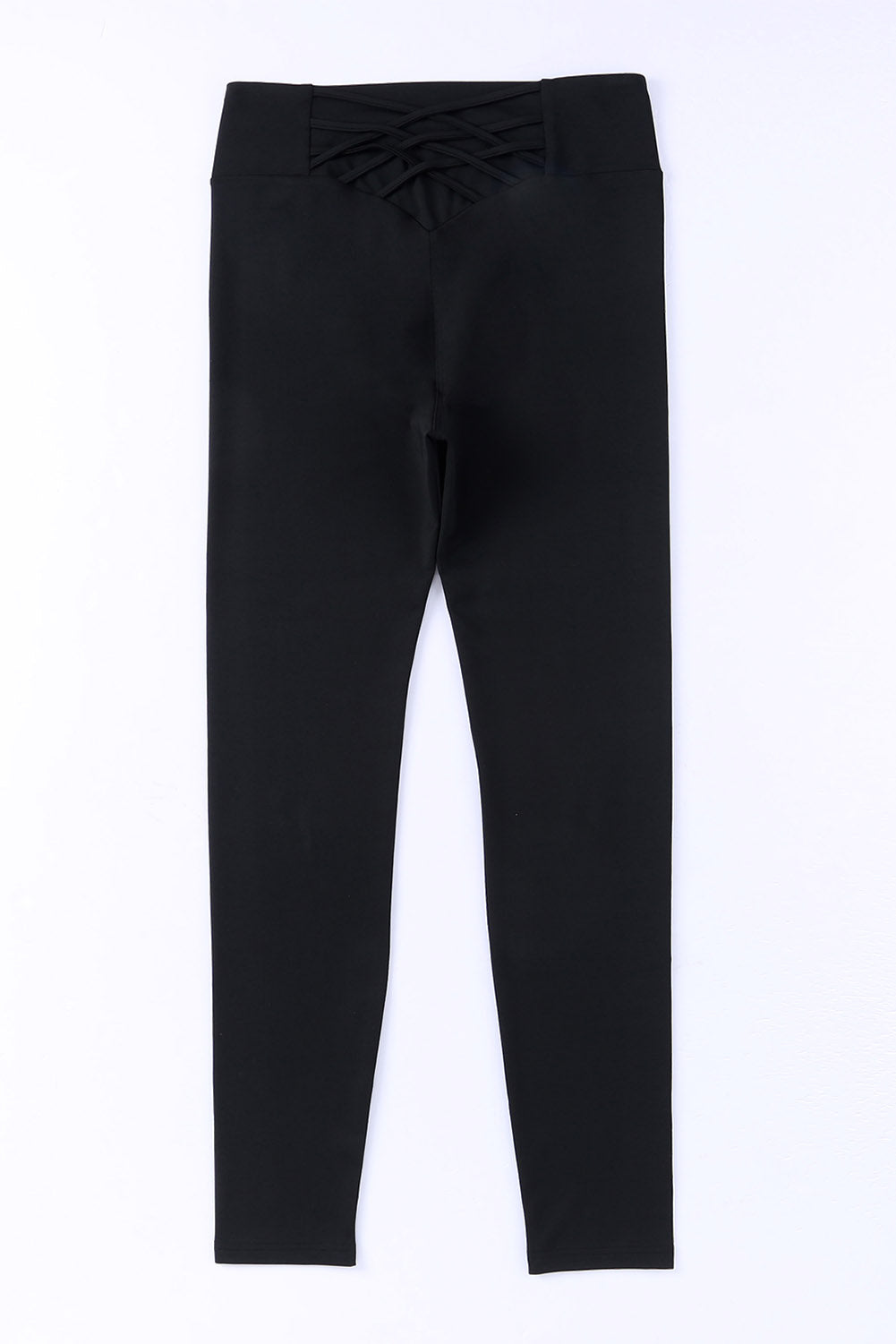 Flaunt your figure with our Black Criss Cross Tummy Control High Waist Leggings! Designed to give you a sleek and smooth silhouette, these leggings feature a high waist and criss cross detailing to enhance your curves and provide ultimate tummy control. Feel confident and comfortable all day long!