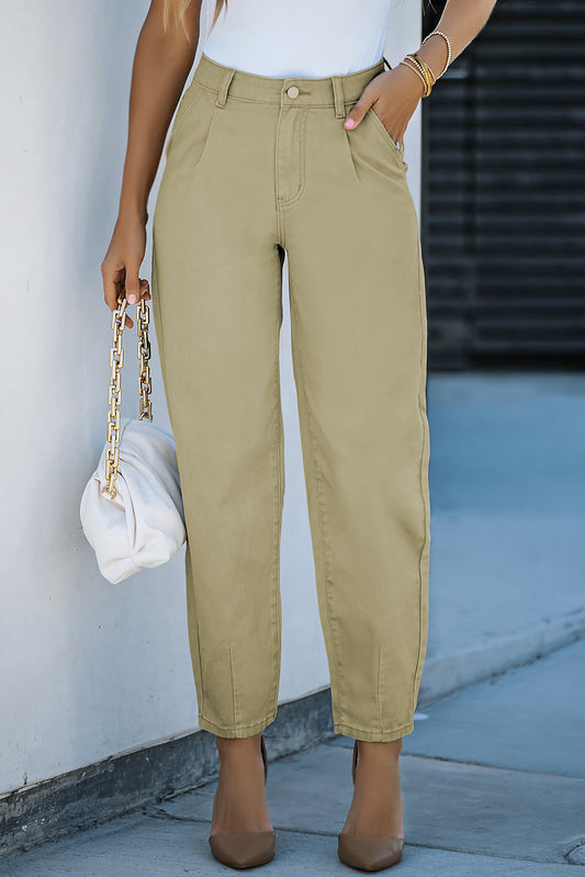 These Khaki Solid High Waist Casual Pants are the perfect combination of style and comfort. The high-waist design and loose legs create a flattering, slender figure while the cotton material ensures a comfortable fit. Dress them up or down with a tank top, T-shirt, or shirt - these pants are versatile and reflect your personal taste. Elevate your wardrobe with these simple yet stylish pants!