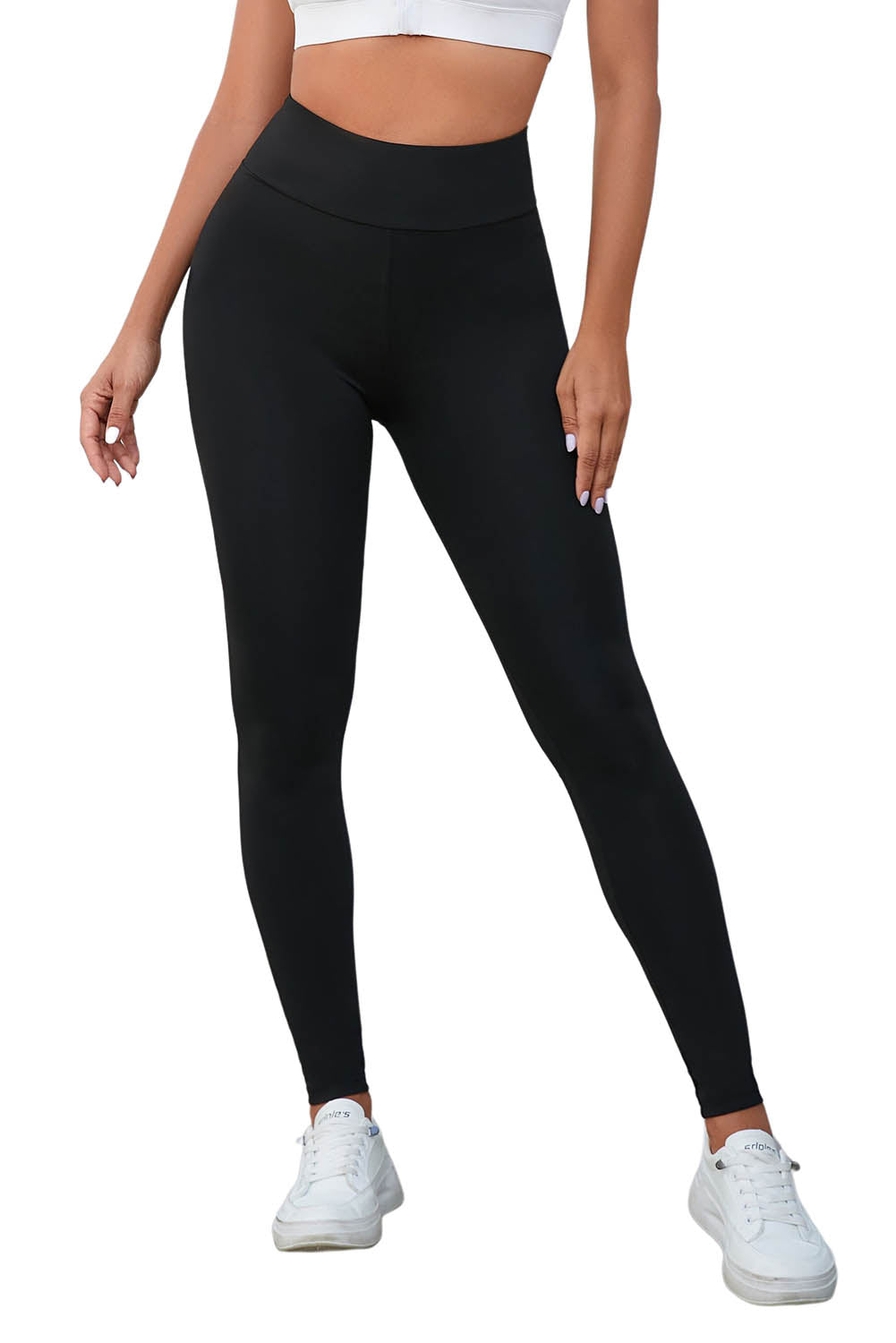 Flaunt your figure with our Black Criss Cross Tummy Control High Waist Leggings! Designed to give you a sleek and smooth silhouette, these leggings feature a high waist and criss cross detailing to enhance your curves and provide ultimate tummy control. Feel confident and comfortable all day long!