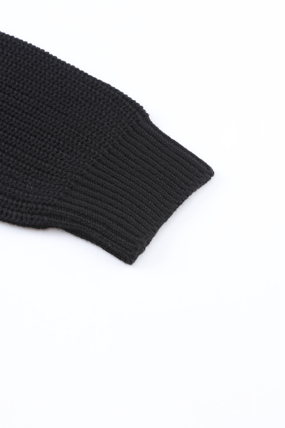 Cozy up in style with our Black Ribbed Knit V Neck Sweater. Made with a soft and stretchy ribbed knit fabric, this sweater features a flattering v neck design. Perfect for pairing with jeans or leggings, it's a versatile and stylish addition to any wardrobe.