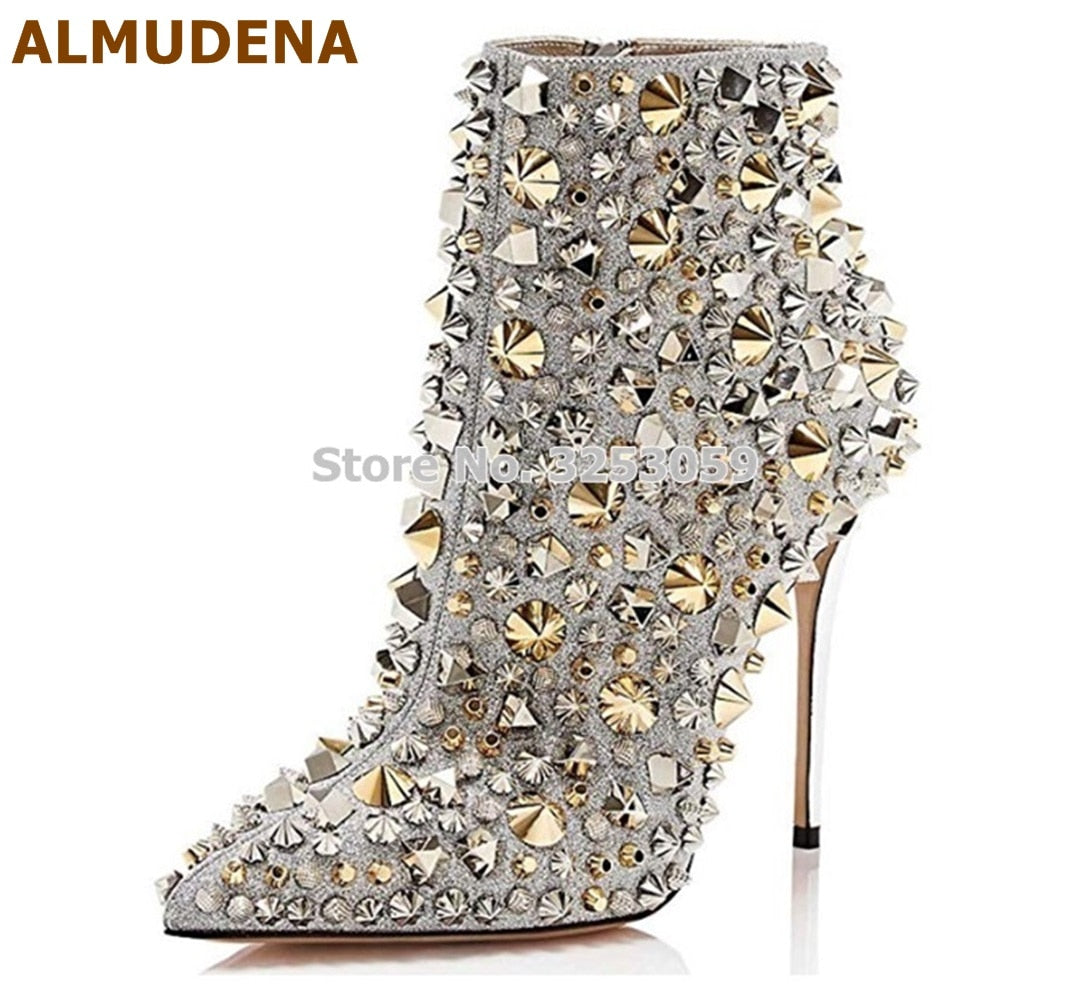 Step out in style with these stunning Rhinestone High Heel Ankle Boots! The sparkling rhinestones in gold and silver add a touch of glamour to any outfit. Elevate your look and walk with confidence in these eye-catching boots. Perfect for a night out or special occasion.