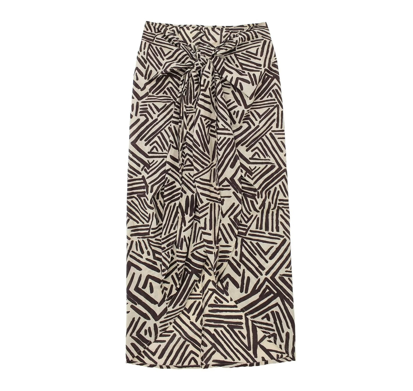 Add a touch of elegance to your summer wardrobe with our one-size-fits-all flowy skirt! Featuring a bold graphic print in red, or a chic tan and black option, this skirt is perfect for any occasion - whether it be a day at the office, a fun evening out, or a casual daytime look. Stay stylish and comfortable all summer long!