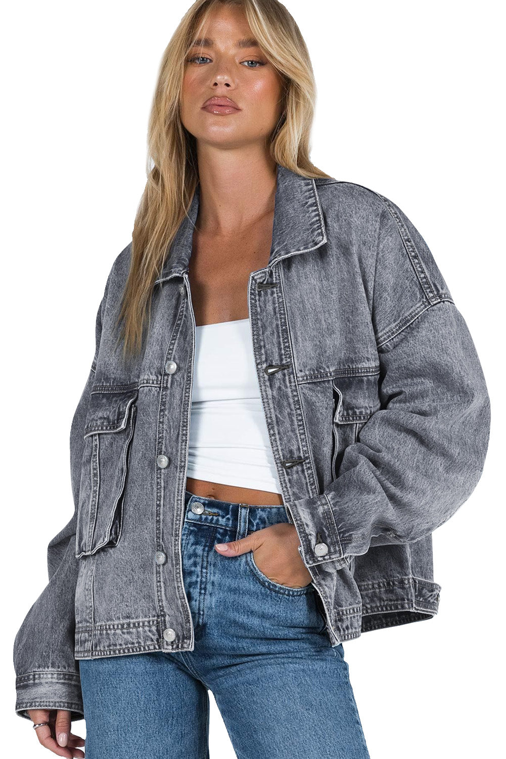 Get ready to rock any look with our Gray Chest Pockets Drop Shoulder Loose Denim Jacket. The ultimate layering piece, its versatile fit is perfect for all body types. The metal buttons add a touch of cool and durability, while the drop shoulder design gives off an effortless vibe. Plus, the chest pockets add both practicality and style.