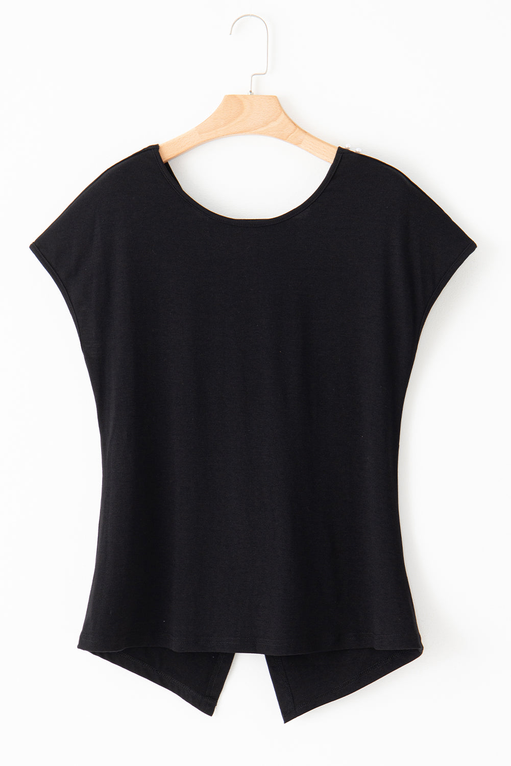 Looking for something that will add a touch of elegance to your casual wardrobe? Look no further than our Black Pearls Embellished Twist Back Tee! With a unique twist back design and glimmering black pearl embellishments, this tee is perfect for a playful and chic look.