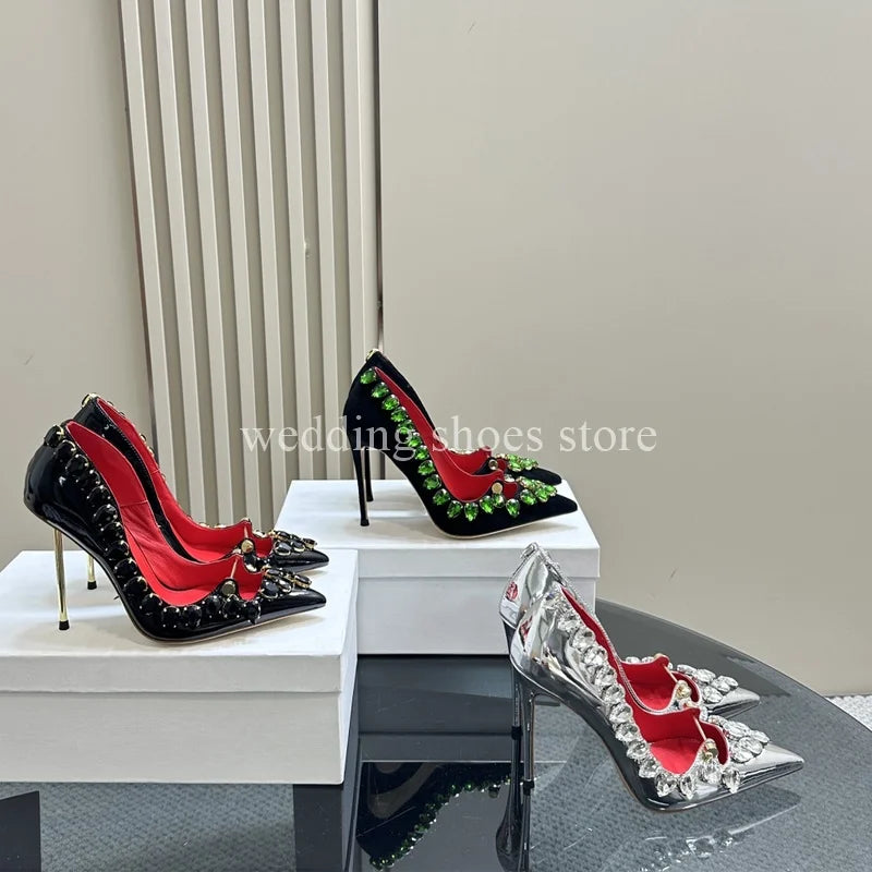 These stunning Rhinestone Studded High Heels are the perfect addition to any wardrobe. Made from high-quality patent leather with a sexy pointed toe design, these stiletto heels are both fashionable and functional. The rhinestone details add a touch of glamour, making you feel confident and luxurious with every step. Elevate your style game with these must-have heels!