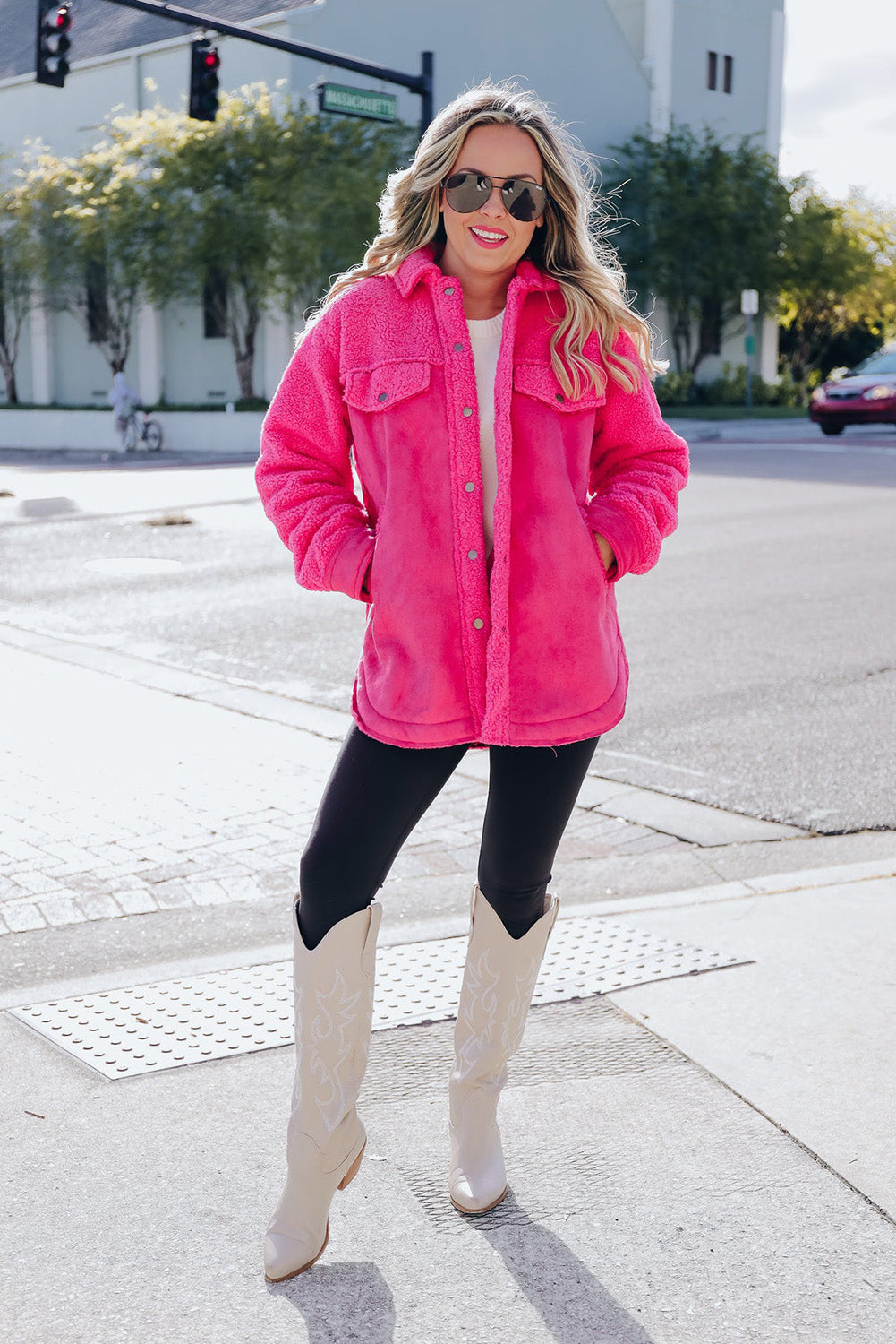 Introducing a cozy yet vibrant addition to your wardrobe: the Bright Pink Faux Suede Sherpa Button-Up Cardigan. Crafted with comfort and style in mind, this cardigan offers both warmth and flair, perfect for the modern woman who values both fashion and functionality