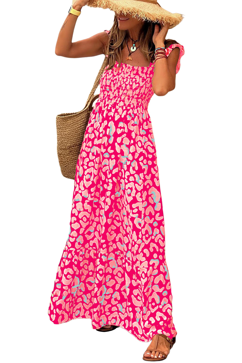 Indulge in the fierce yet feminine style of our Pink Leopard Ruffle Straps Smocked High Waist Long Dress. With its playful ruffle straps and flattering smocked high waist design, this dress will have you feeling confident and stylish. The bold pink leopard print adds a touch of wildness to any occasion.