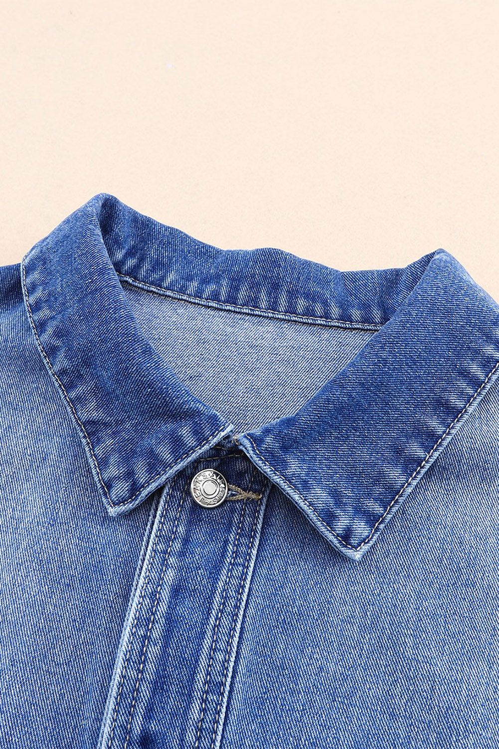 Get ready to drop it like it's hot in our Blue Chest Pockets Drop Shoulder Loose Denim Jacket! With its trendy oversized fit, convenient chest pockets, and unique dropped shoulder design, this jacket is perfect for a casual, yet stylish look. Say hello to your new favorite wardrobe staple, available now in blue denim.