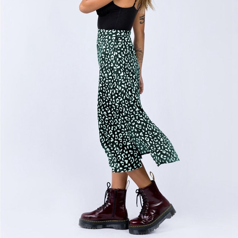 Indulge in the wild side with our Sexy Leopard Print Chiffon Split Long Skirt. The bold animal print and sultry side split make a statement, while the zipper closure adds a touch of convenience. Channel your inner diva and elevate any outfit with this must-have skirt.