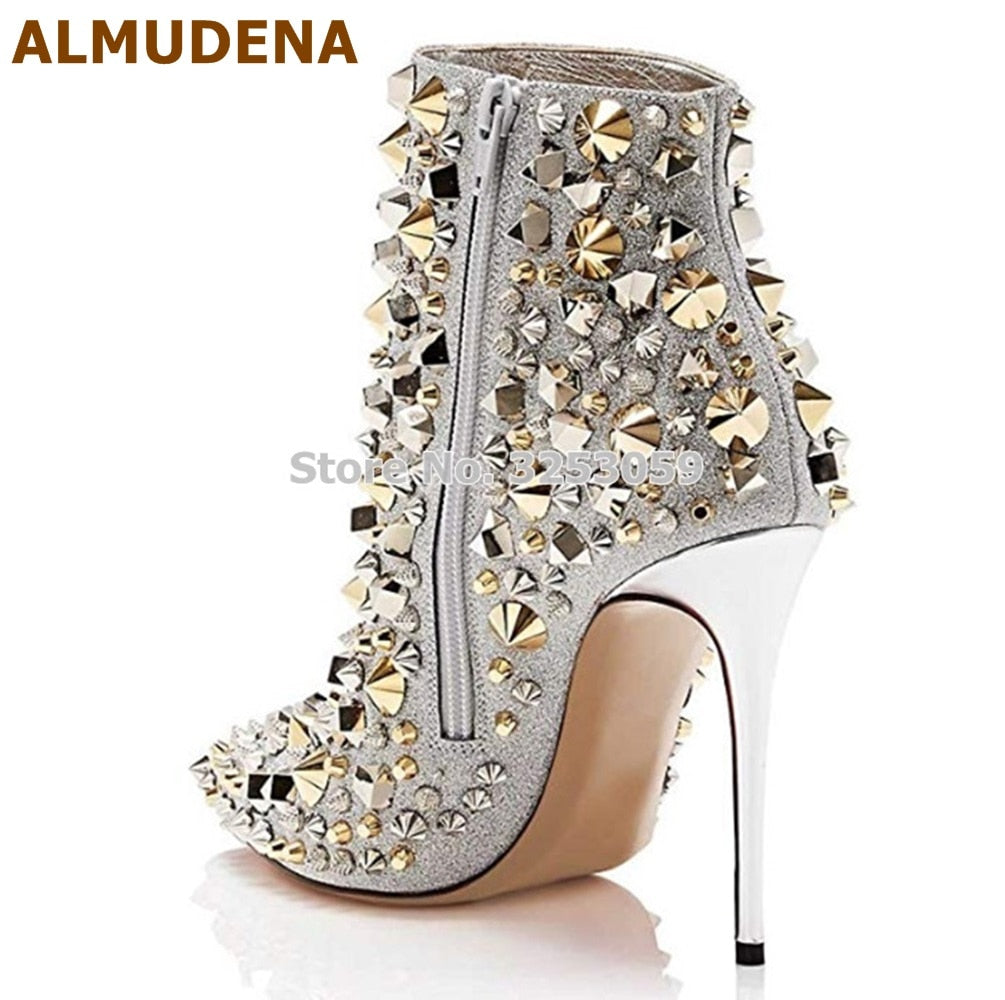 Step out in style with these stunning Rhinestone High Heel Ankle Boots! The sparkling rhinestones in gold and silver add a touch of glamour to any outfit. Elevate your look and walk with confidence in these eye-catching boots. Perfect for a night out or special occasion.