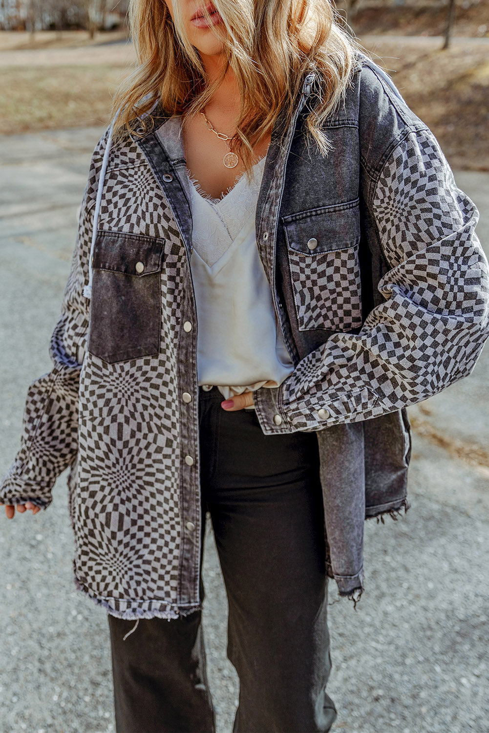 Transform your denim game with our Gray Checked Patchwork Frayed Hem Hooded Denim Shacket! The high waist design adds a touch of sexiness while the paper bag waist brings a feminine and chic look. The mineral wash gives it a fashionable edge, and the fold edge takes it to a whole new level.