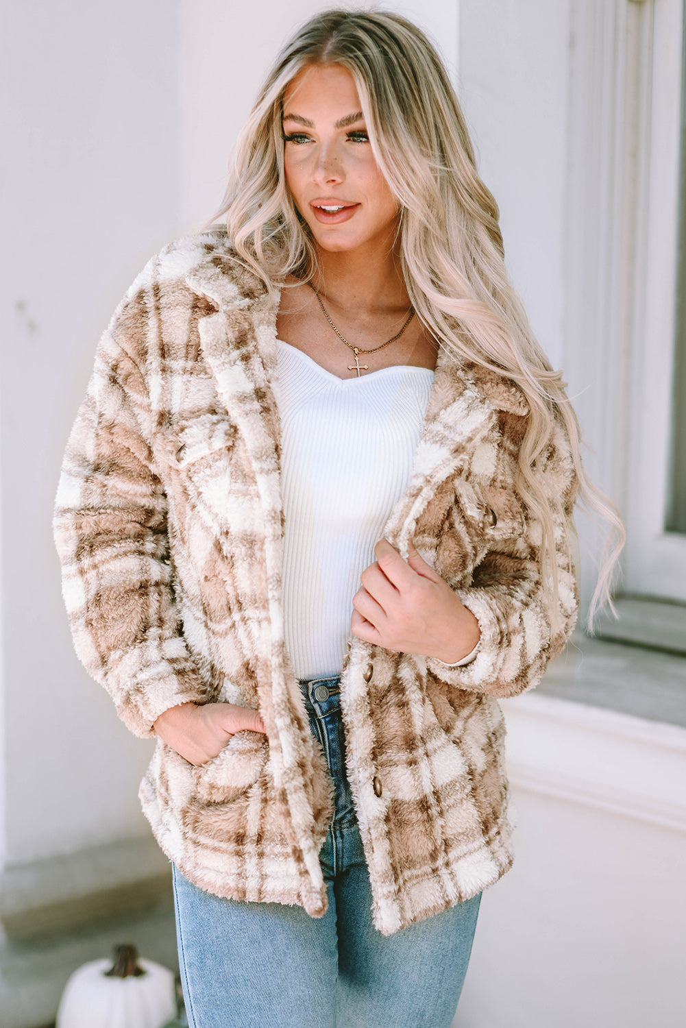 Stay warm and stylish with our Khaki Sherpa Plaid Button Pocketed Jacket. Made with soft sherpa, this jacket will keep you comfortable all day long. The spacious pockets allow for easy storage of essentials. Crafted with high-quality materials, you can count on this jacket to last. The classic plaid pattern and button front add a timeless touch to any outfit.