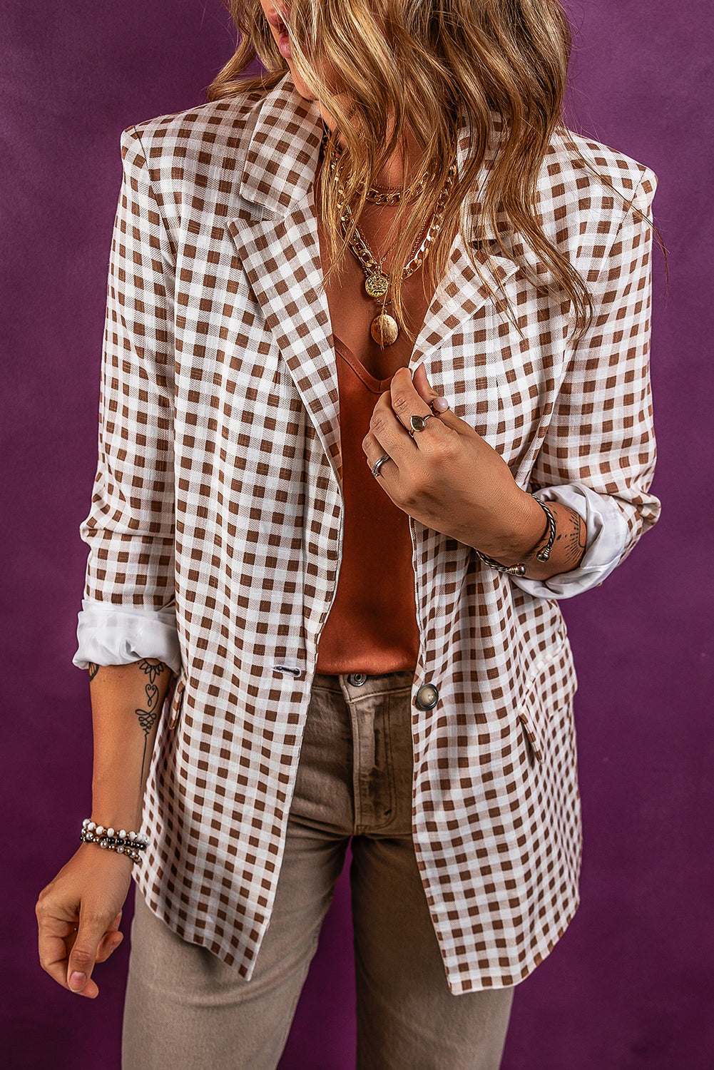 Elevate your style with our Brown &amp; White Chestnut Single Button Blazer! Its lapel collar adds a touch of sophistication, while the single button closure creates a flattering silhouette. Perfect for any occasion, this blazer will make you stand out in all the right ways.