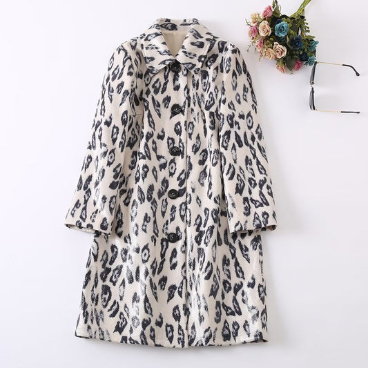 Elevate your style with our Leopard Print Trench Coat! This stunning coat features a classic button down design with a fold down collar, perfect for any occasion. The bold leopard print adds a touch of wild elegance to your look. Stay fierce and fashionable in our must-have coat!