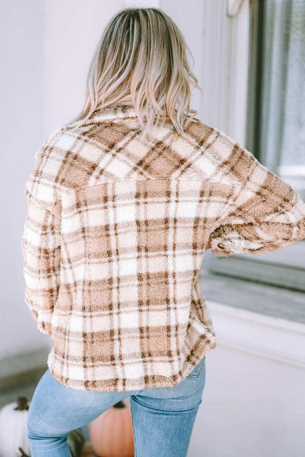 Stay warm and stylish with our Khaki Sherpa Plaid Button Pocketed Jacket. Made with soft sherpa, this jacket will keep you comfortable all day long. The spacious pockets allow for easy storage of essentials. Crafted with high-quality materials, you can count on this jacket to last. The classic plaid pattern and button front add a timeless touch to any outfit.