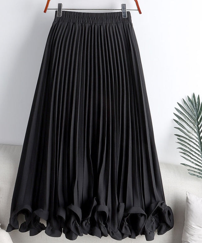 Experience timeless elegance with our Elegant Vintage Irregular Ruffles Pleated Midi Skirt! The high waist and pleats create a flattering silhouette while the irregular ruffles add a touch of vintage charm. The elastic waistband ensures a comfortable fit, making this the perfect addition to your wardrobe. Elevate your style and feel confident in this stunning skirt!