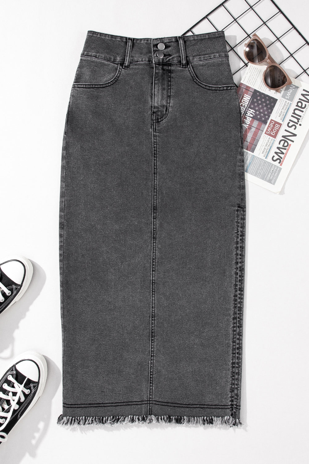 Introducing our stunning Black Raw Edge Side Slits Button Up Midi Denim Skirt! Crafted with high-quality denim, this skirt is perfect for any occasion. The raw edge and side slits add a touch of edginess, while the button-up design adds a dash of sophistication. Elevate your wardrobe with this must-have piece!