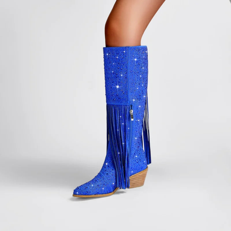 Elevate your western style with our Knee High Rhinestone Boots! Available in 3 stunning colors, these boots feature rhinestones and tassels that will add a touch of sparkle to any outfit. Perfect for all occasions, they will make you stand out and feel confident. Upgrade your wardrobe with these must-have boots.