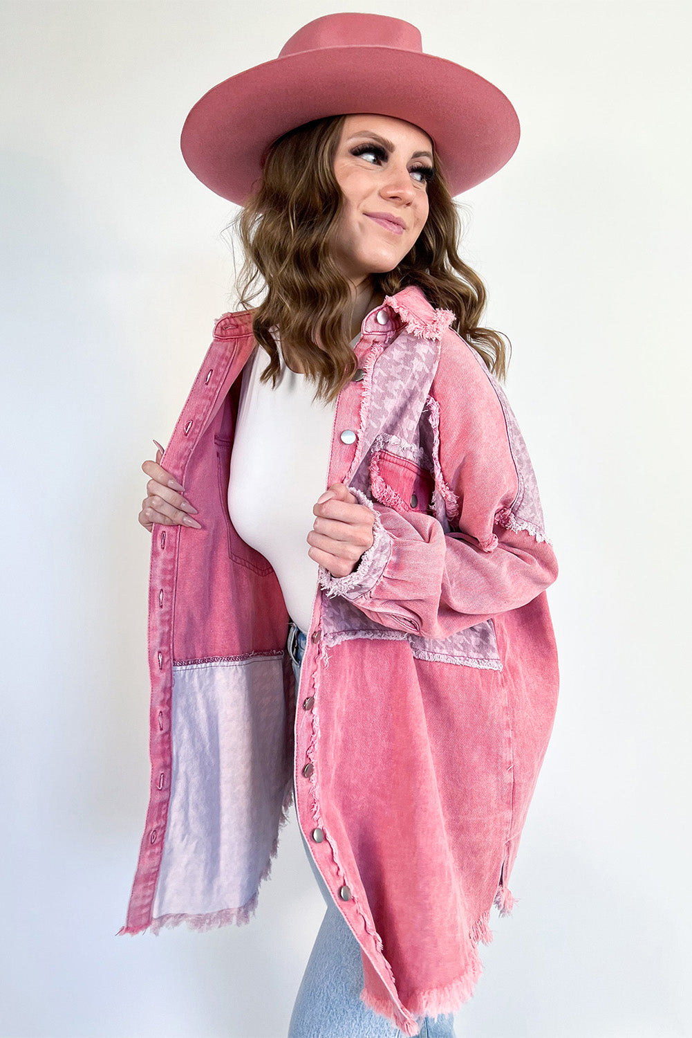 Indulge in a retro and distressed feel with our Pink Retro Distressed Houndstooth Patchwork Denim Jacket. The unique patchwork design adds a touch of personality to your style, while the houndstooth print brings a classic and timeless charm. Made from durable denim, this jacket is perfect for any season and will elevate any outfit with its eye-catching pink hue!