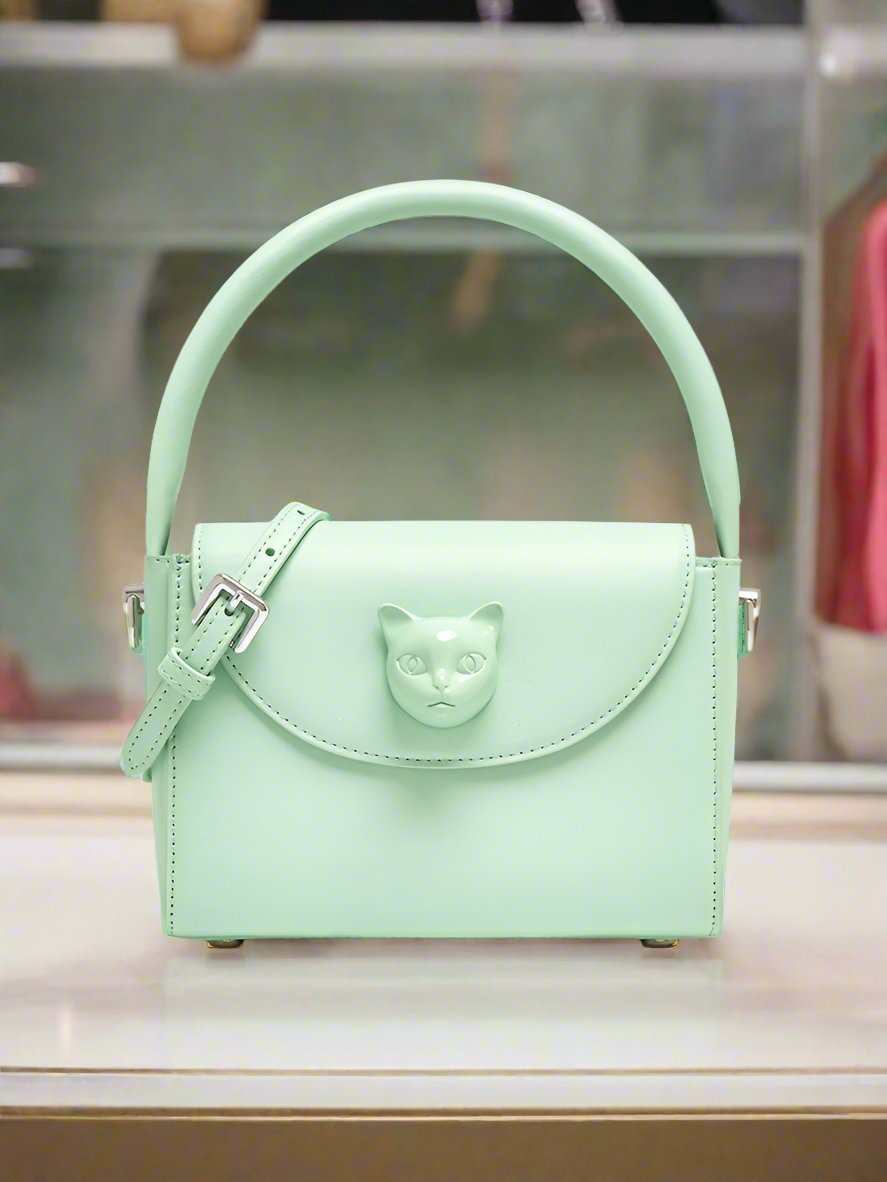 Indulge in luxury with the Bafelli Designer Hand Bag! Made with genuine leather and featuring a stylish top handle, this bag is the perfect combination of fashion and functionality. With its pastel colors, it will add a touch of elegance to any outfit. Elevate your style game with the Bafelli Designer Hand Bag.