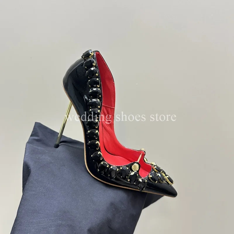 These stunning Rhinestone Studded High Heels are the perfect addition to any wardrobe. Made from high-quality patent leather with a sexy pointed toe design, these stiletto heels are both fashionable and functional. The rhinestone details add a touch of glamour, making you feel confident and luxurious with every step. Elevate your style game with these must-have heels!