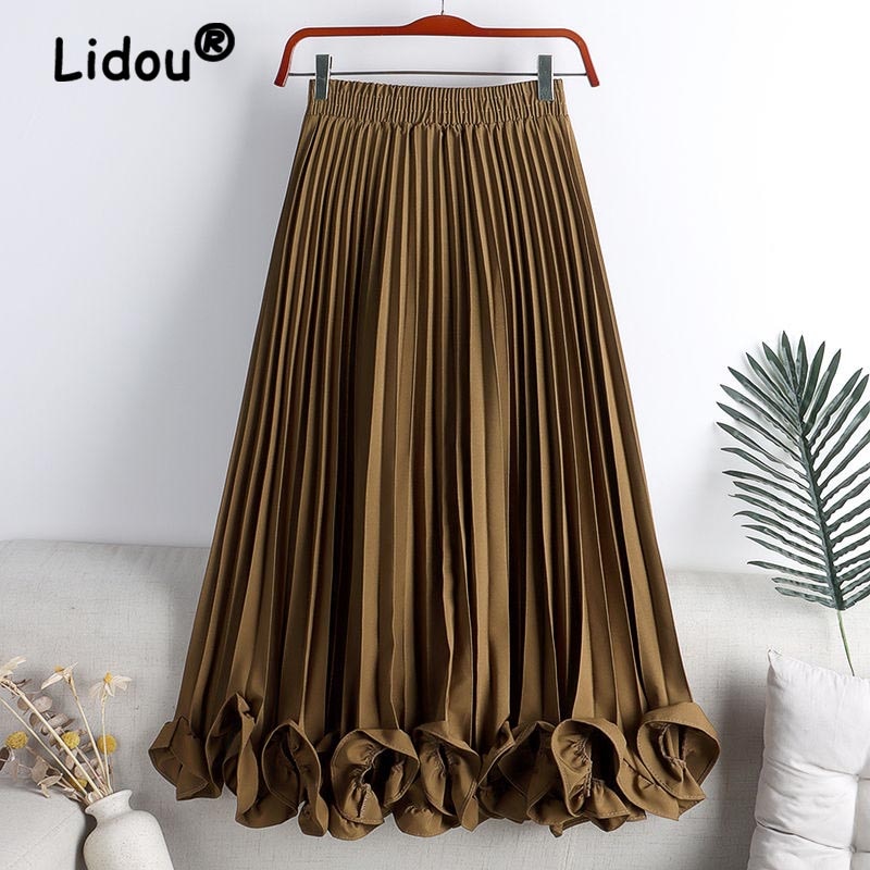 Experience timeless elegance with our Elegant Vintage Irregular Ruffles Pleated Midi Skirt! The high waist and pleats create a flattering silhouette while the irregular ruffles add a touch of vintage charm. The elastic waistband ensures a comfortable fit, making this the perfect addition to your wardrobe. Elevate your style and feel confident in this stunning skirt!