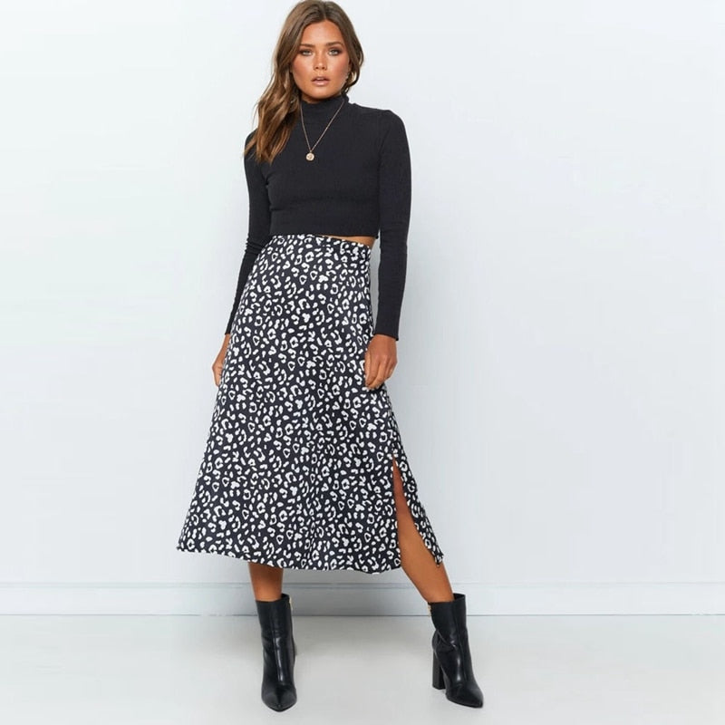 Indulge in the wild side with our Sexy Leopard Print Chiffon Split Long Skirt. The bold animal print and sultry side split make a statement, while the zipper closure adds a touch of convenience. Channel your inner diva and elevate any outfit with this must-have skirt.