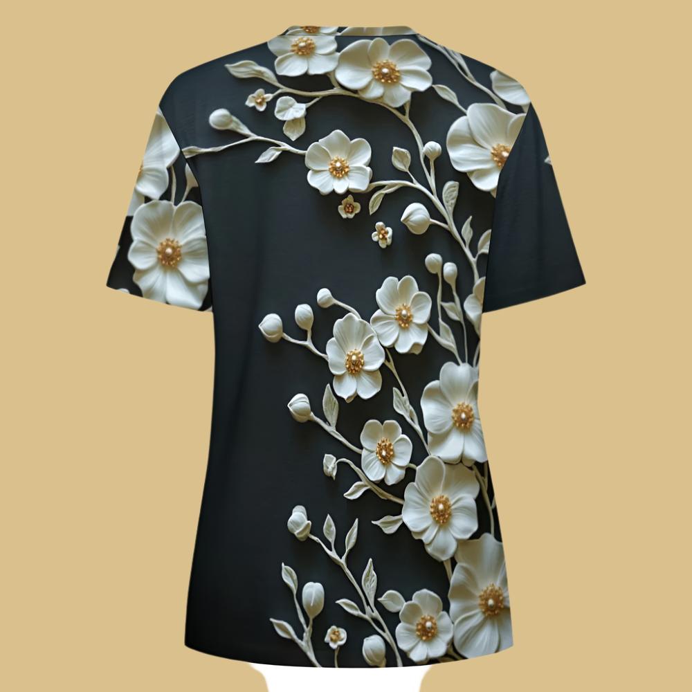 Enhance your wardrobe with our Elegant Floral Print Graphic Tee, crafted from 100% breathable cotton for ultimate comfort. This beautifully designed shirt features delicate white and gold floral patterns on a deep black background, offering a timeless and sophisticated look