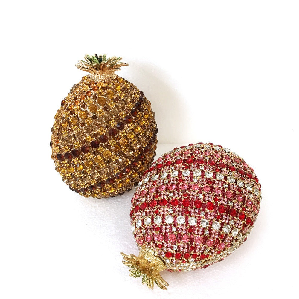 Indulge in the luxurious elegance of our Fruit pineapple shaped crystal banquet bag! Featuring a stunning diamond inlay and rhinestone details, this clutch bag exudes sophistication and glamour. With a convenient chain shoulder strap, it comes in both red and gold for the perfect touch of color. Elevate any outfit with this must-have accessory.