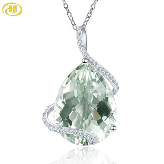 Add a touch of natural beauty to your outfit with our Green Amethyst 925 Silver Pendant. The natural big gemstone and sterling silver chain make for a stunning combination. Handcrafted to perfection, this fine jewelry piece is perfect for any occasion. Elevate your style with our unique pendant!